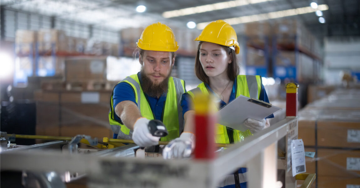 Warehouse staff managing inventory with handheld scanners at Pendulum Logistics Sydney