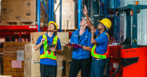 Logistics team monitoring shipments and inventory for supply chain efficiency